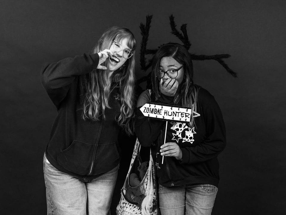 Students posing at photobooth